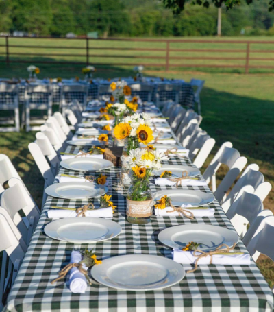 wedding reception dining table set up with sunflowers